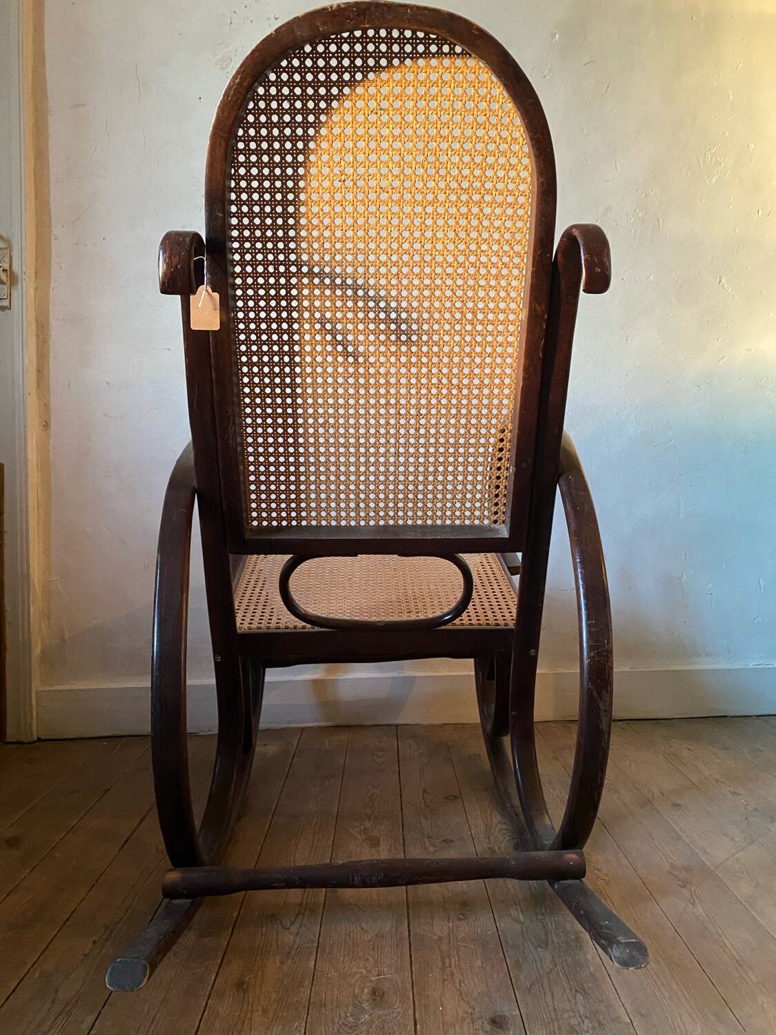 Wood and cane rocking chair