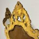 Pair of mirrors in wood decorated with gold leaf.