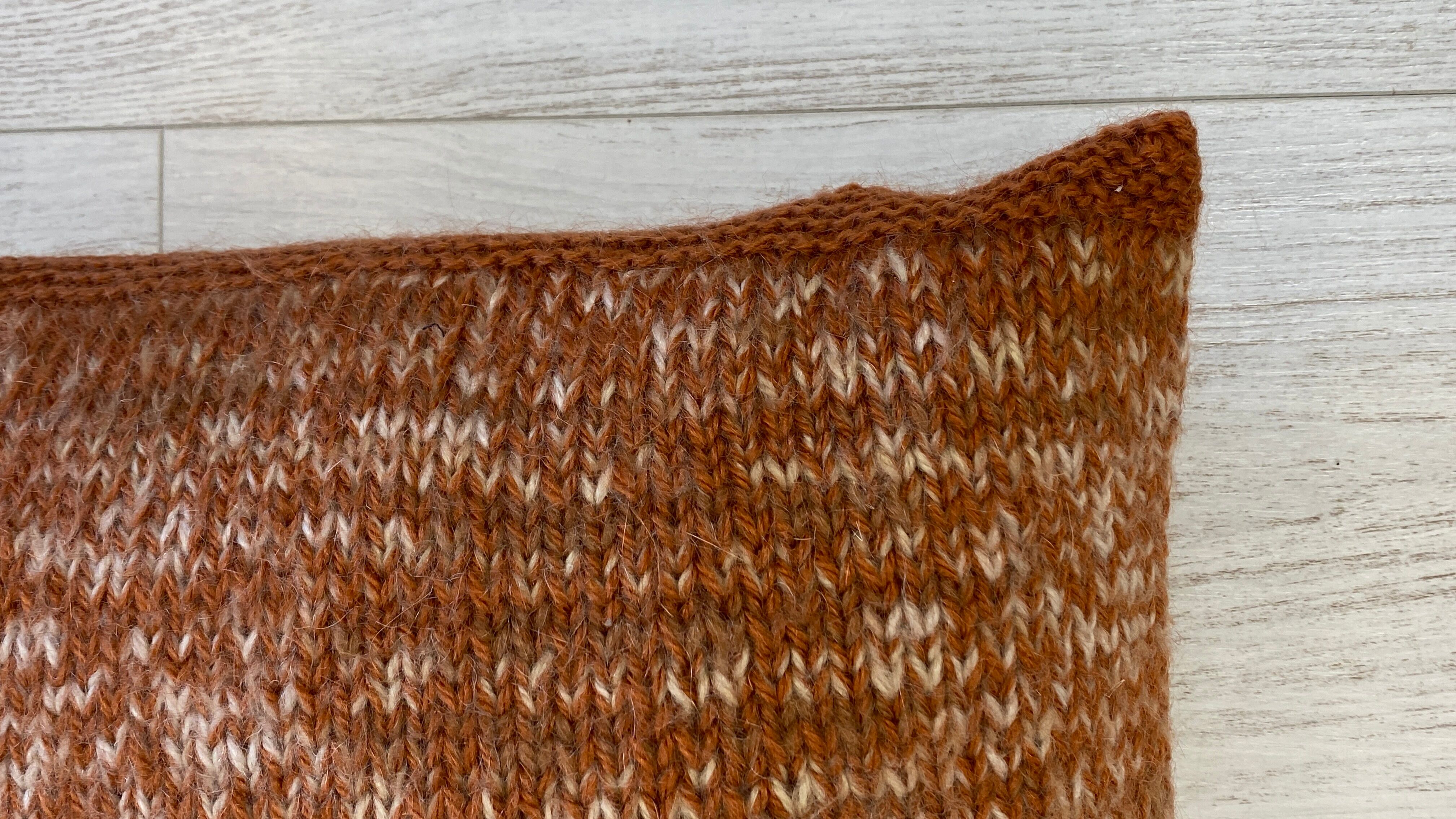 Pair of retro terracotta wool knit cushions