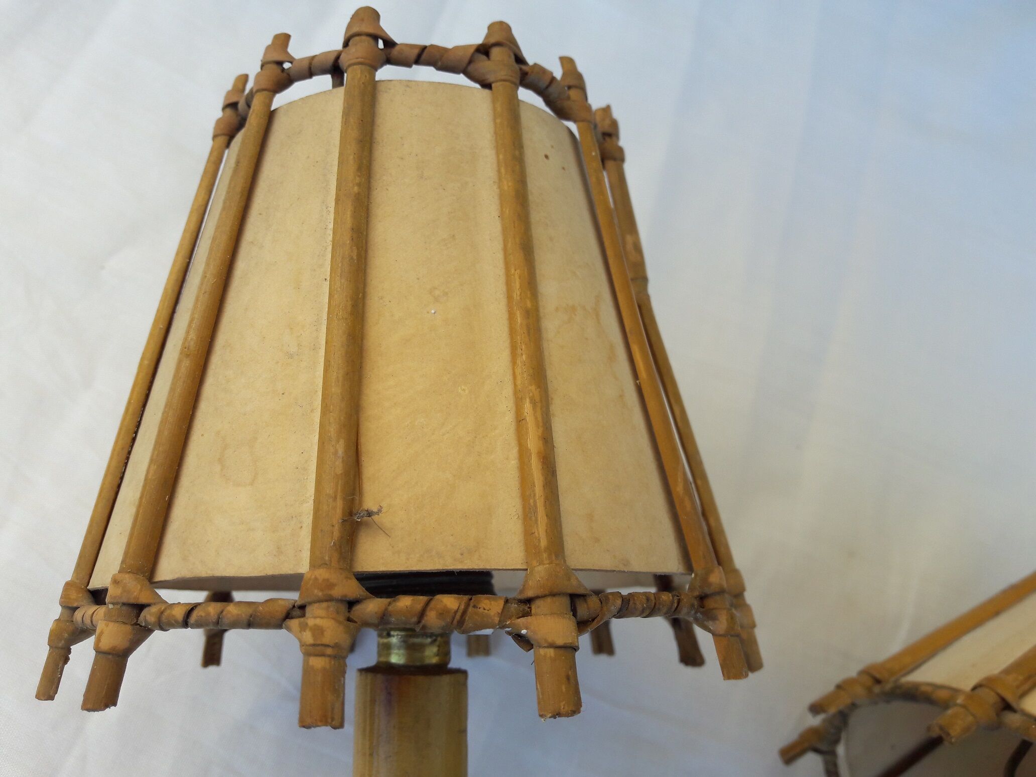 Double rattan sconce