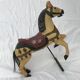 Wooden horse with period ironwork support