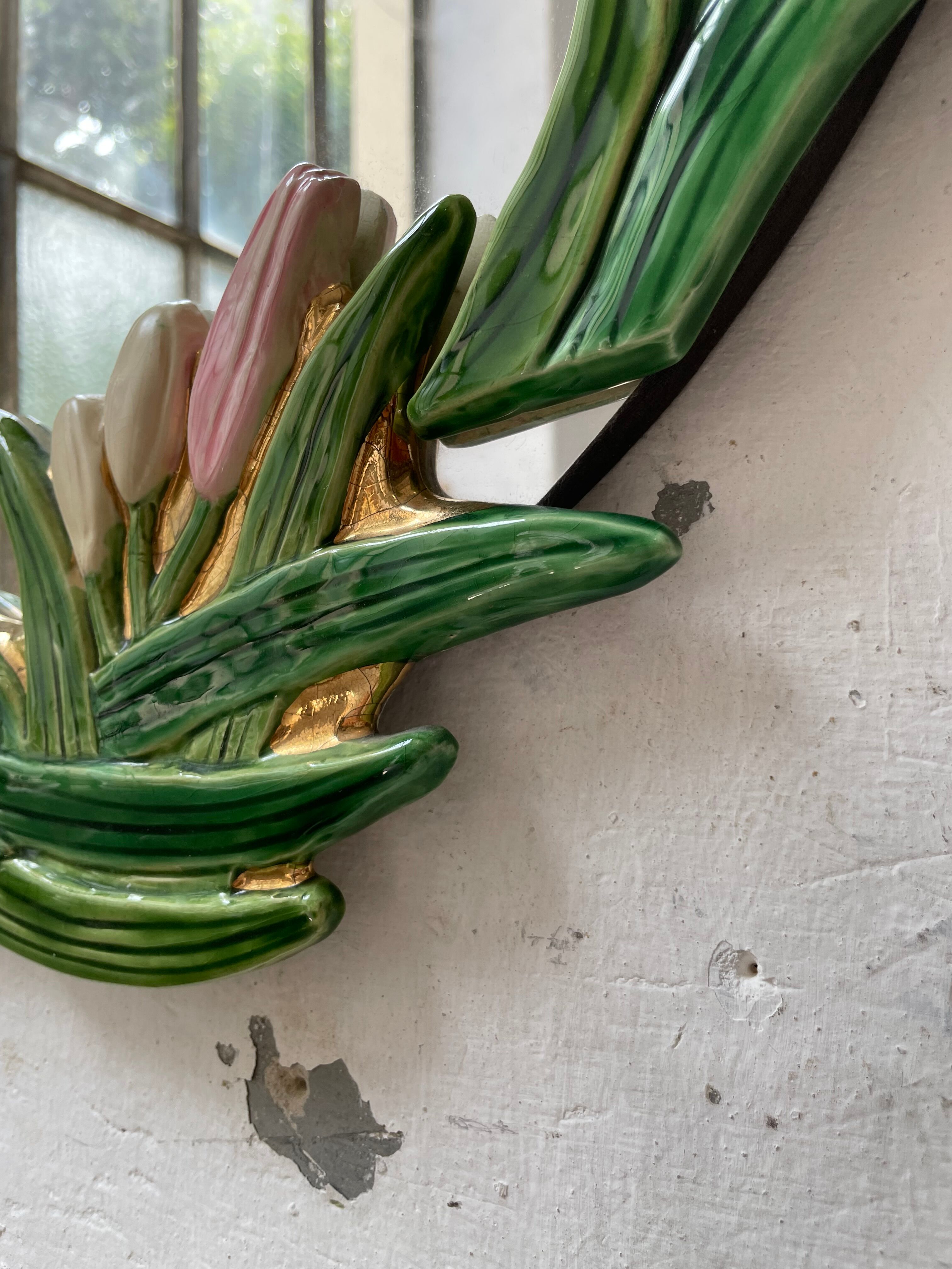 Oval ceramic mirror with flowers