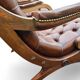 Paire de Chesterfields en cuir et repose pieds