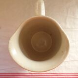 Old faience pitcher