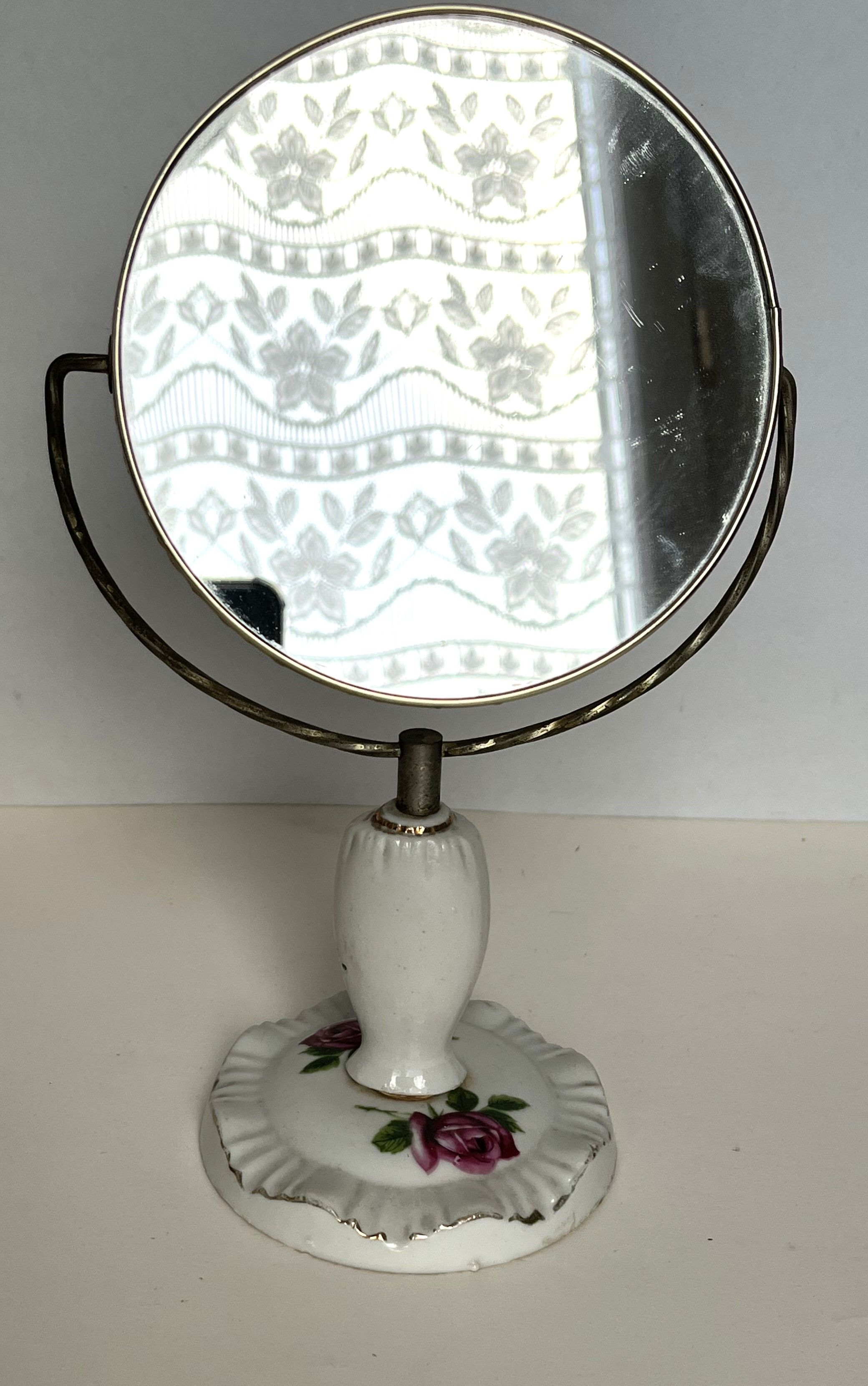 Swivel double-sided toilet mirror