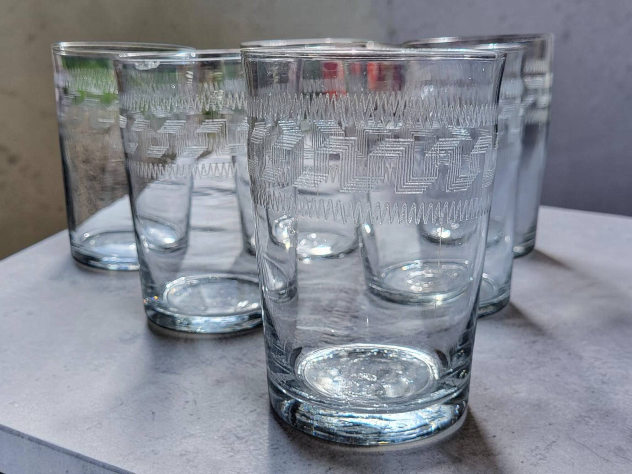 7 decorative Greek-style water glasses