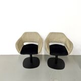 Series of six swivel chairs with an organic shell, patterned fabric and base.