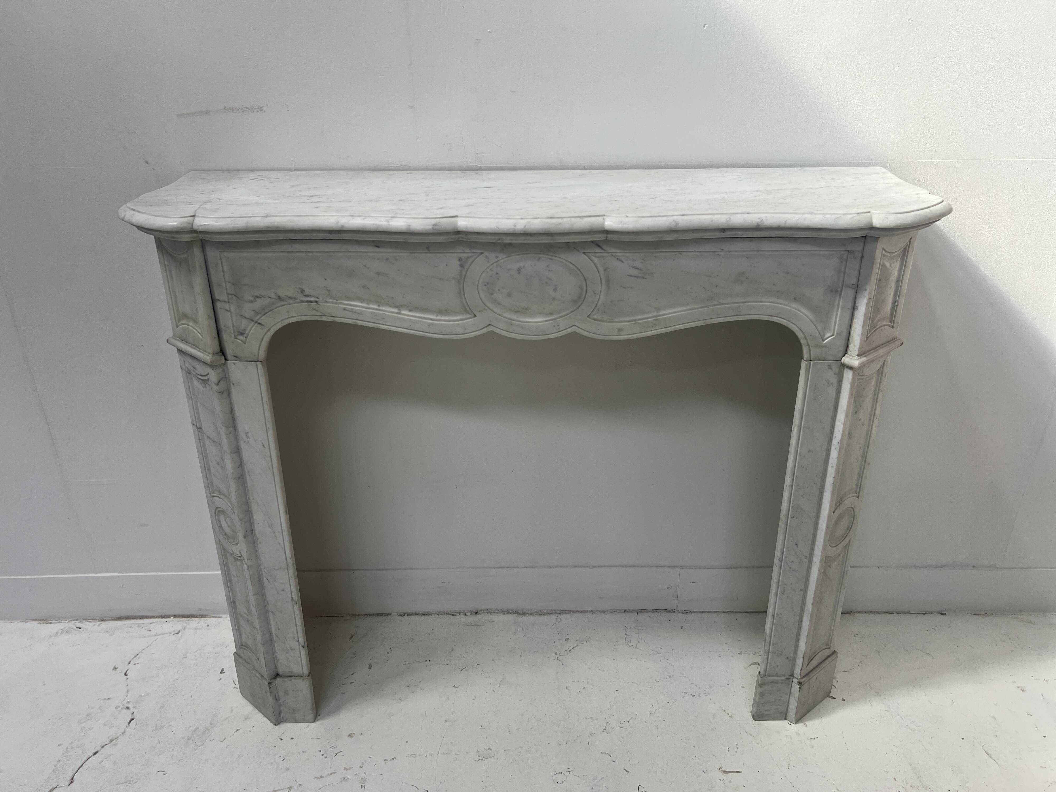 Louis XV style fireplace Model Pompadour White Carrara marble 20th century