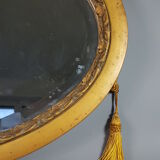 Old bevelled oval mirror with cord and pompoms, 60 x 36 cm