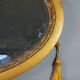Old bevelled oval mirror with cord and pompoms, 60 x 36 cm