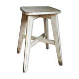 Old workshop stool in patinated solid wood