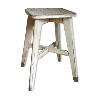 Old workshop stool in patinated solid wood