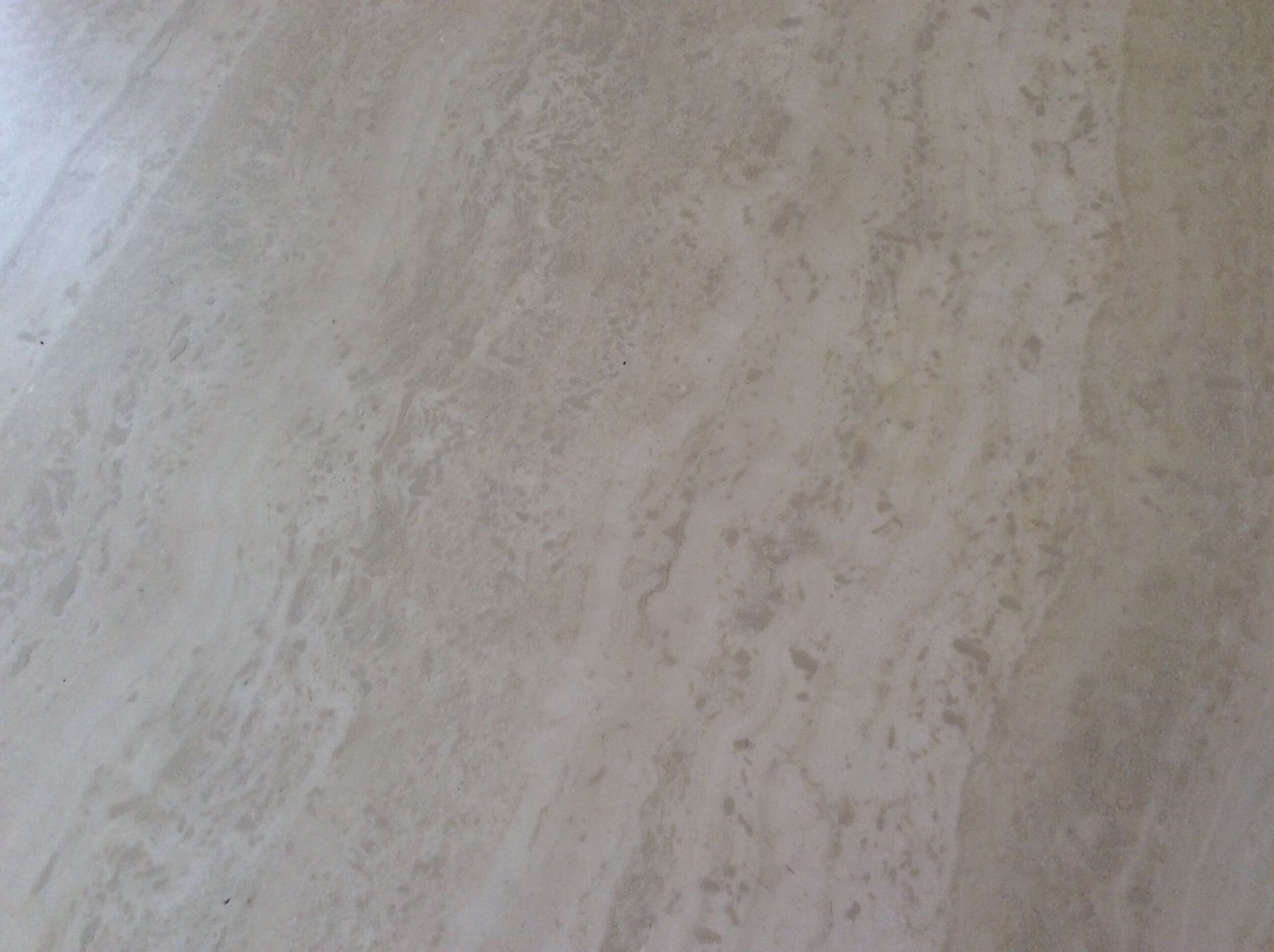 Octagonal coffee table in travertine