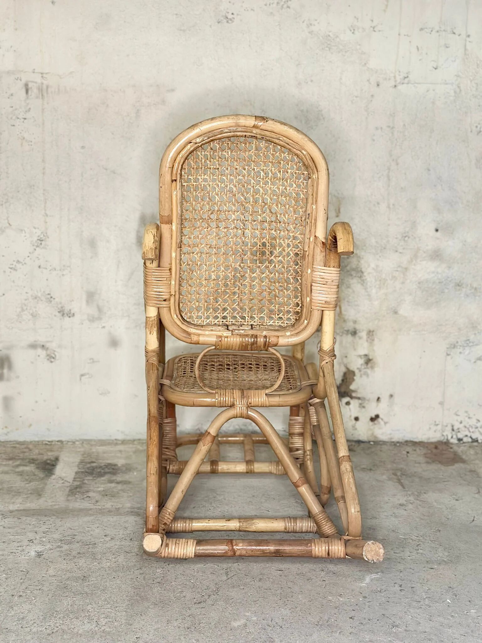 Rattan and cane rocking chair