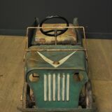 Green metal pedal car