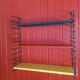 Tomado string shelf