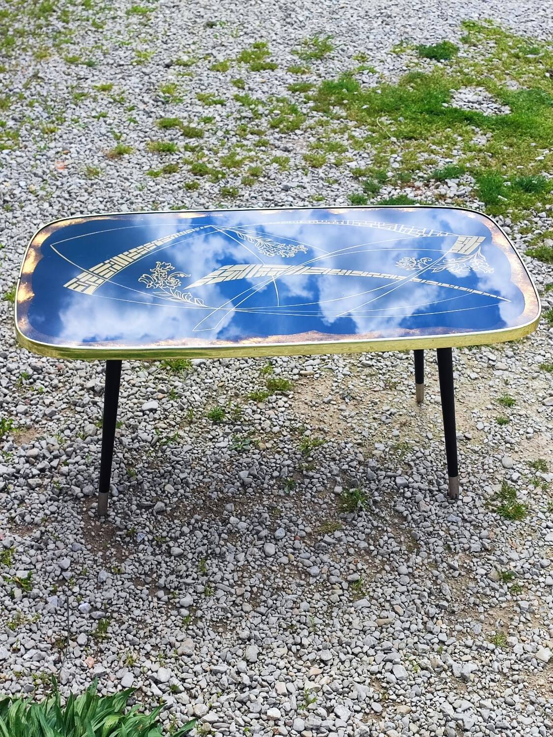 Vintage coffee table with compass legs
