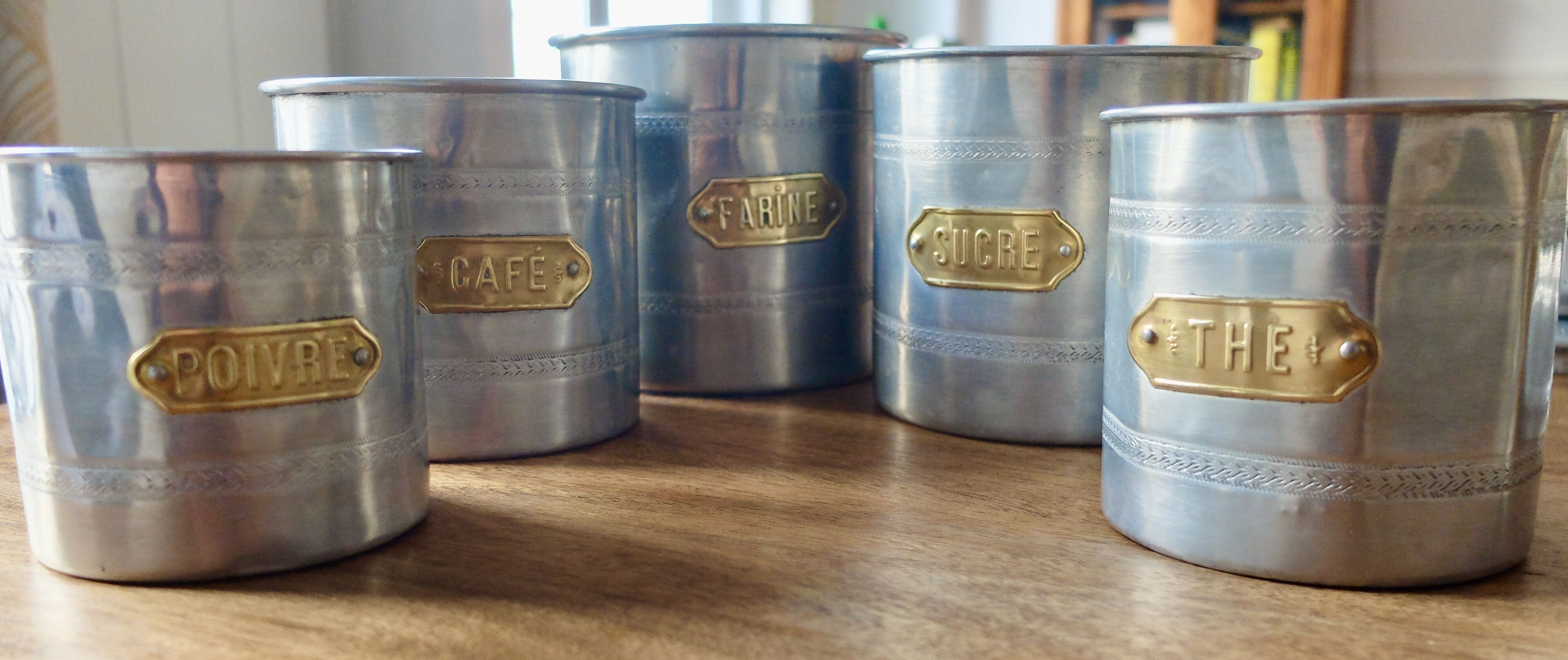 Series of 5 tin spice pots