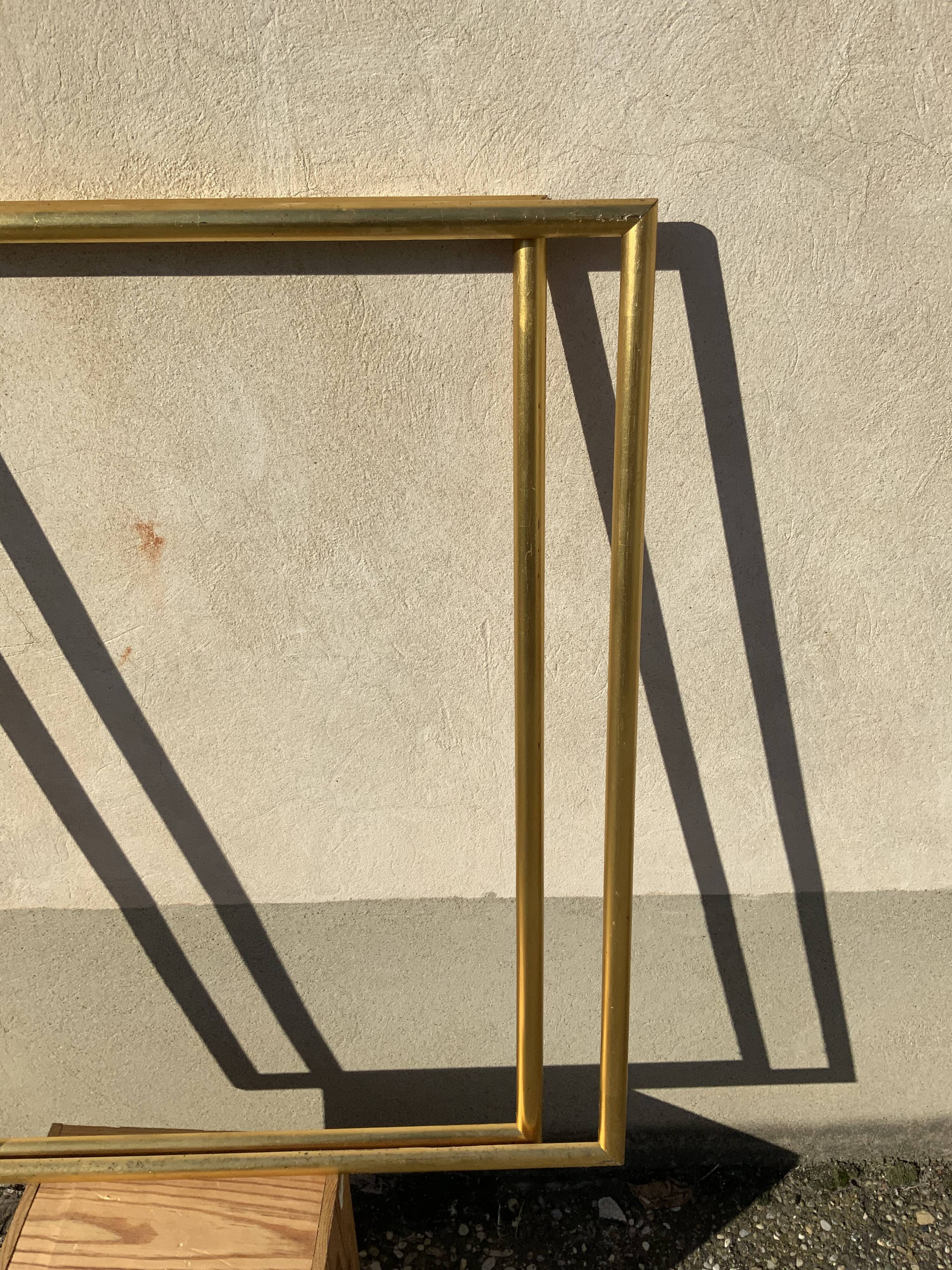 Old frame in gilded wood patina gold leaf