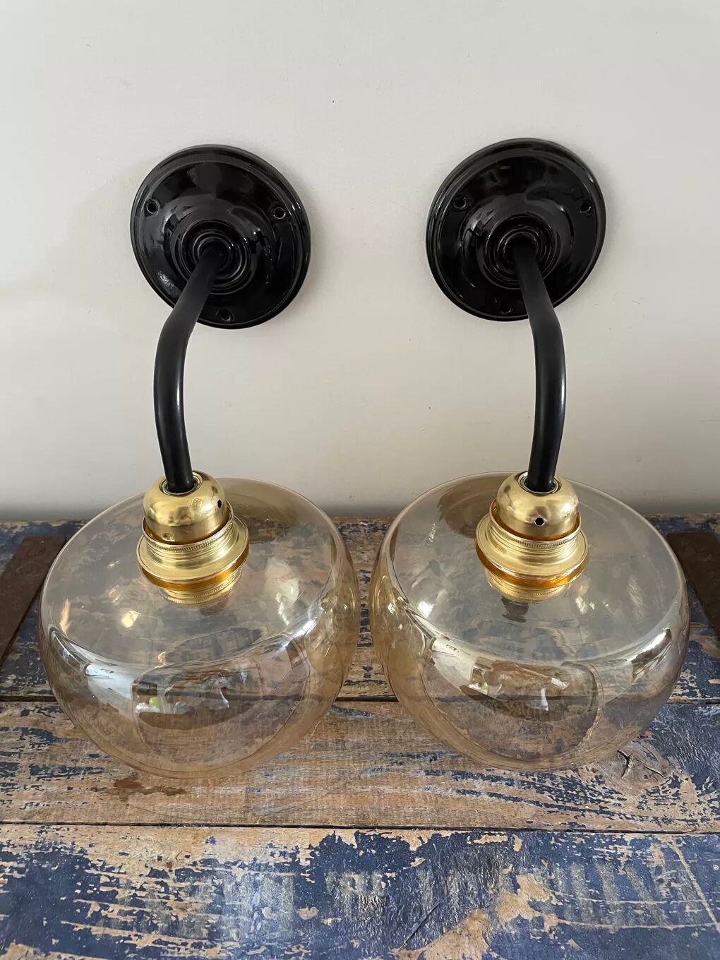 Pair of vintage amber glass wall lights