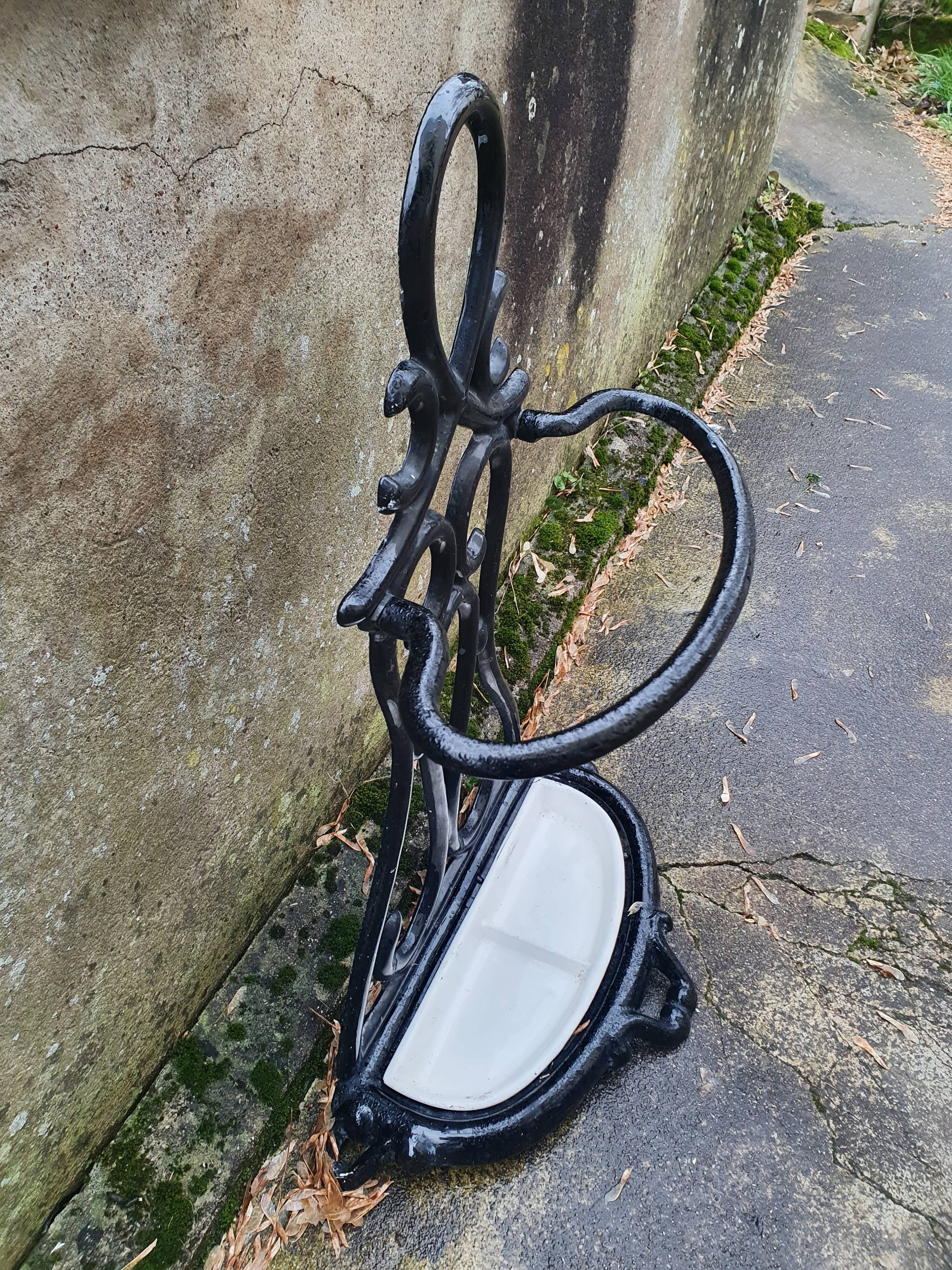 Enamelled cast iron umbrella rod holder