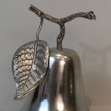 Silver-plated metal and plastic pear-shaped ice bucket.