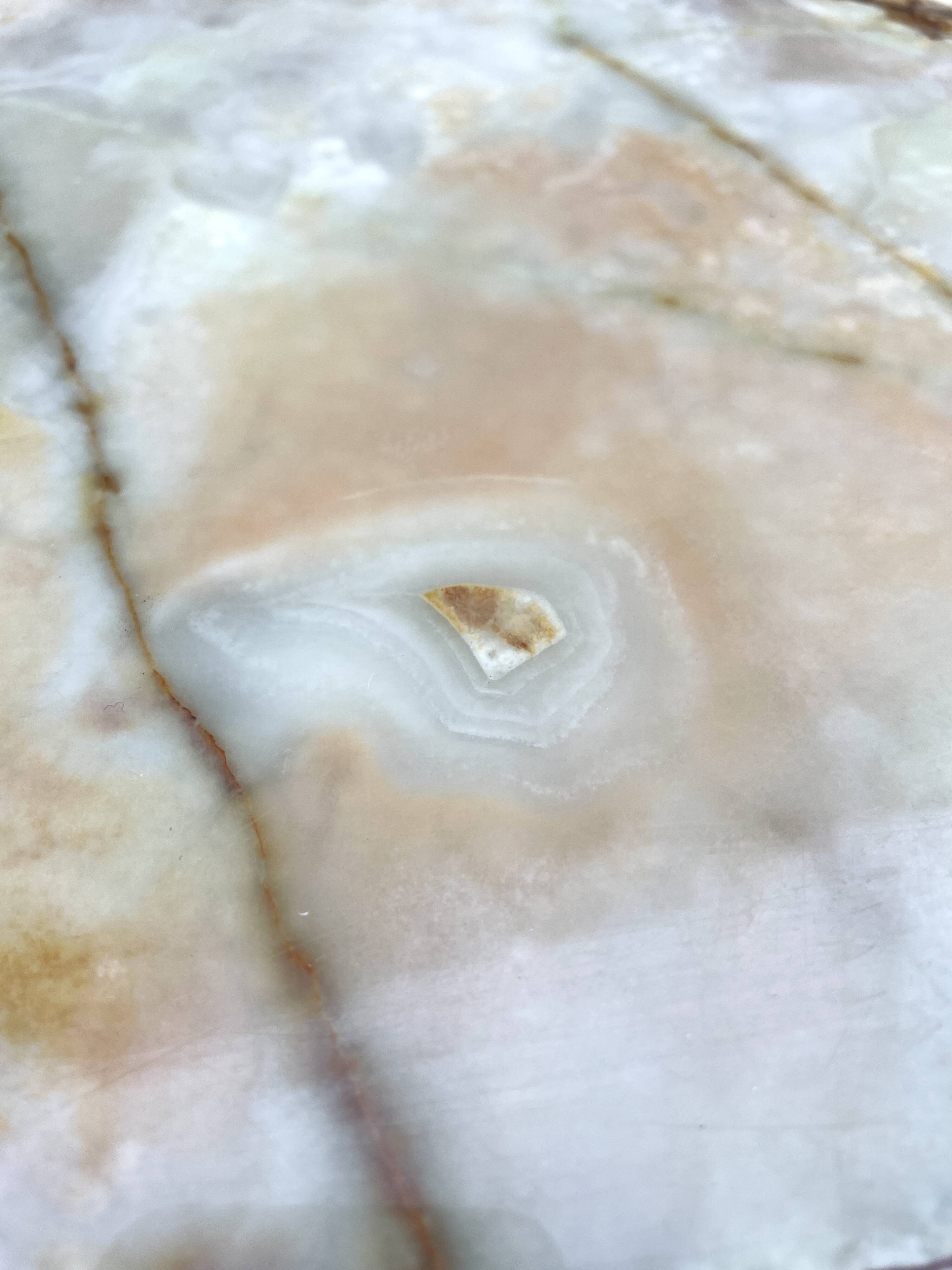 Louis XVI style oval coffee table in onyx and gilt brass