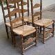 Set of 5 or 4 chic rustic traditional dining chairs with rush seats.