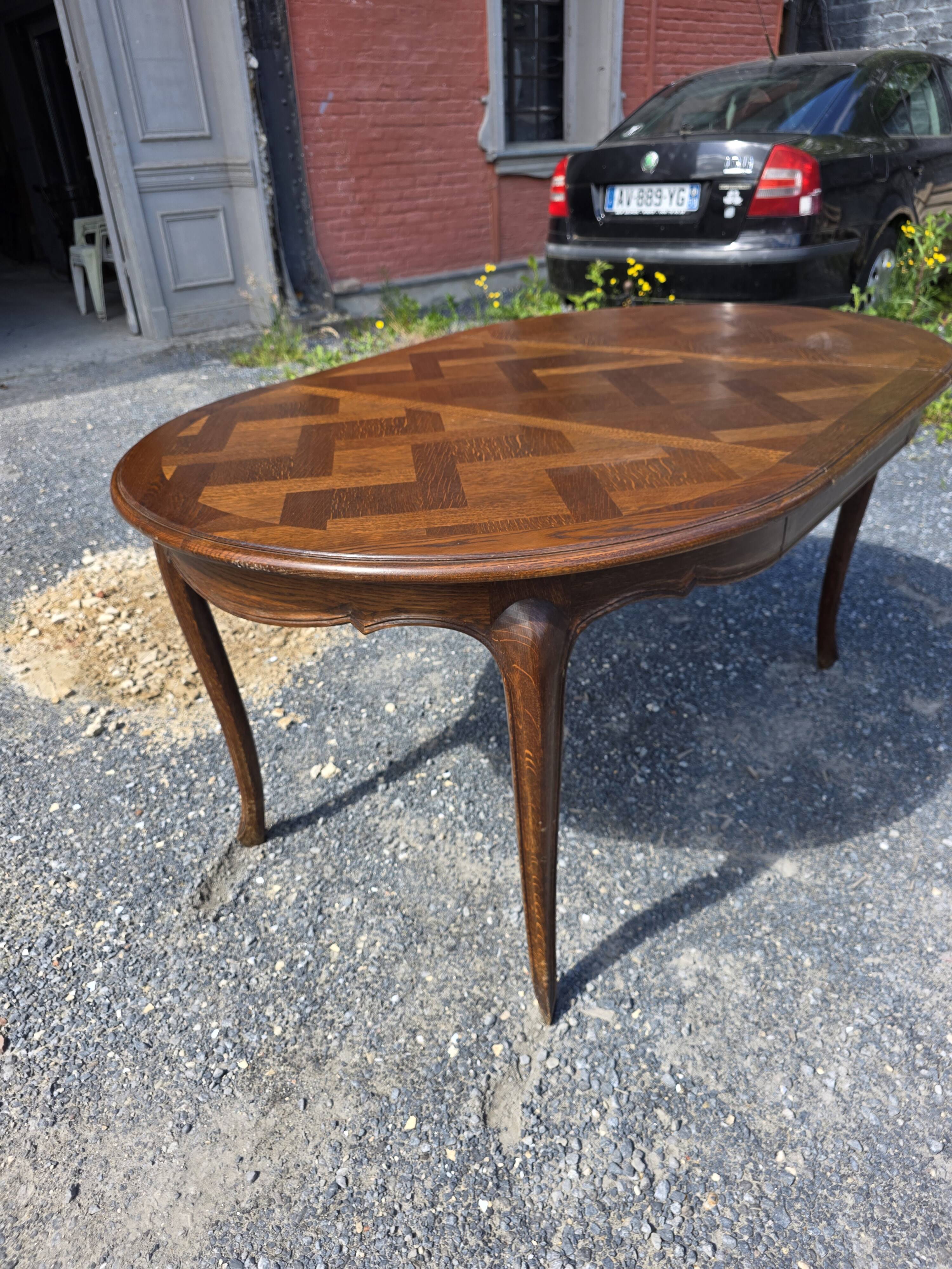 Extendable table in Louis XV style in oak (2 extensions)
