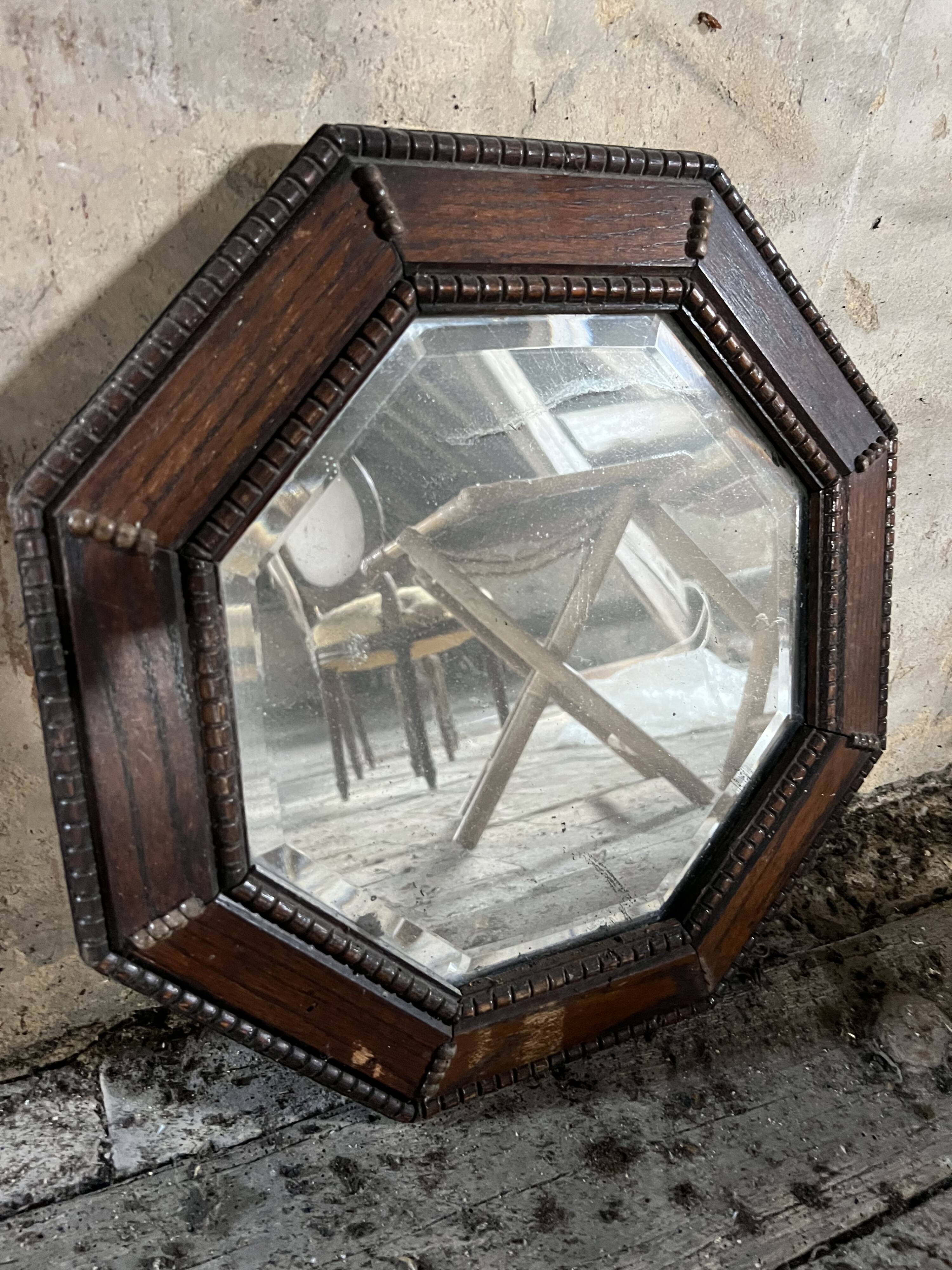 Antique octagonal mirror in dark wood – pearl decoration
