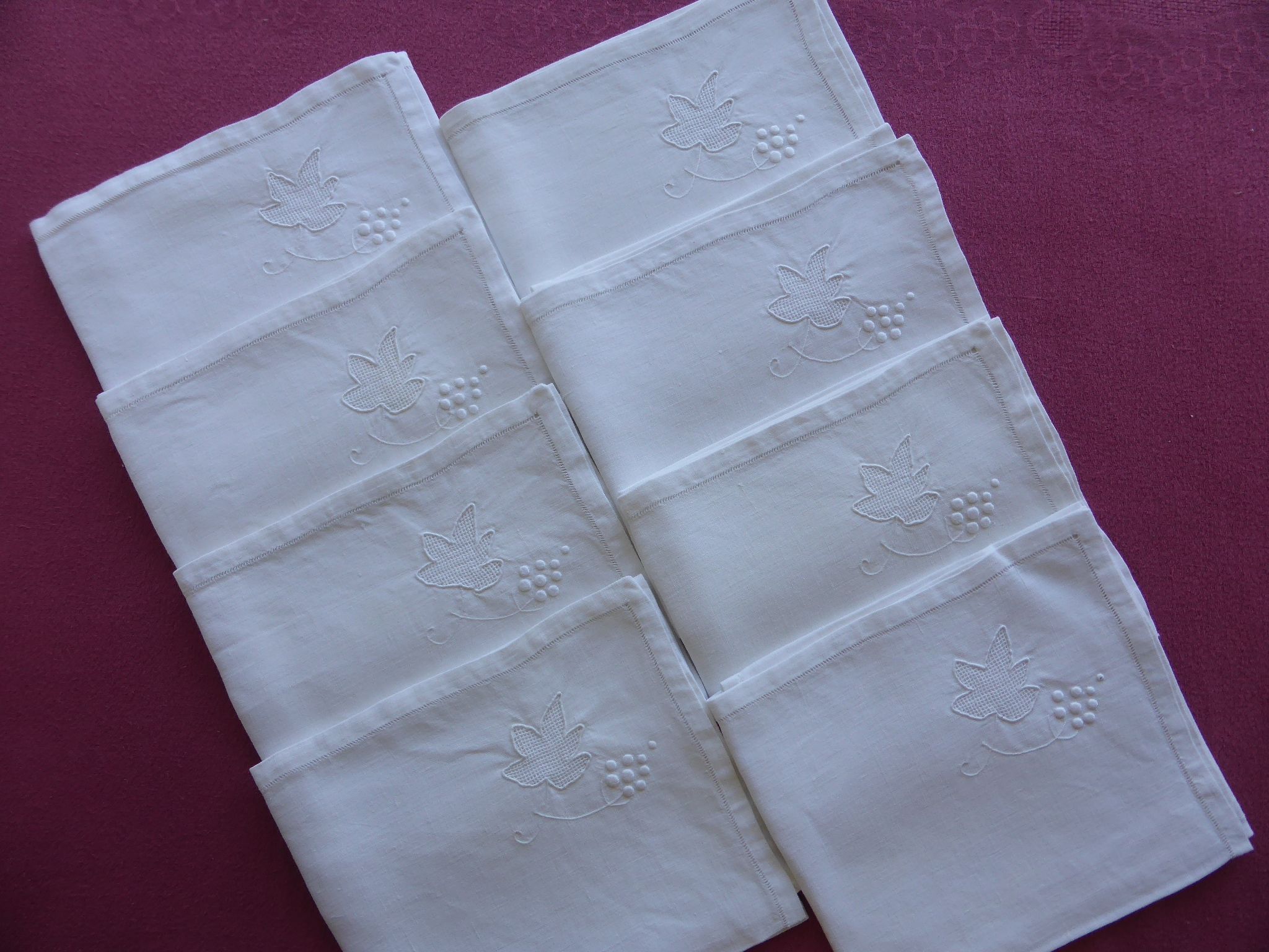 8 old white linen towels embroidered with vine leaves and grape clusters
