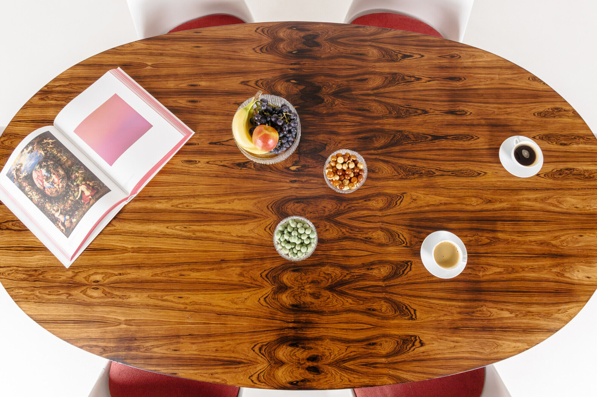 Oval dining table in rosewood by Maurice Burke for Arkana, England, 1960s