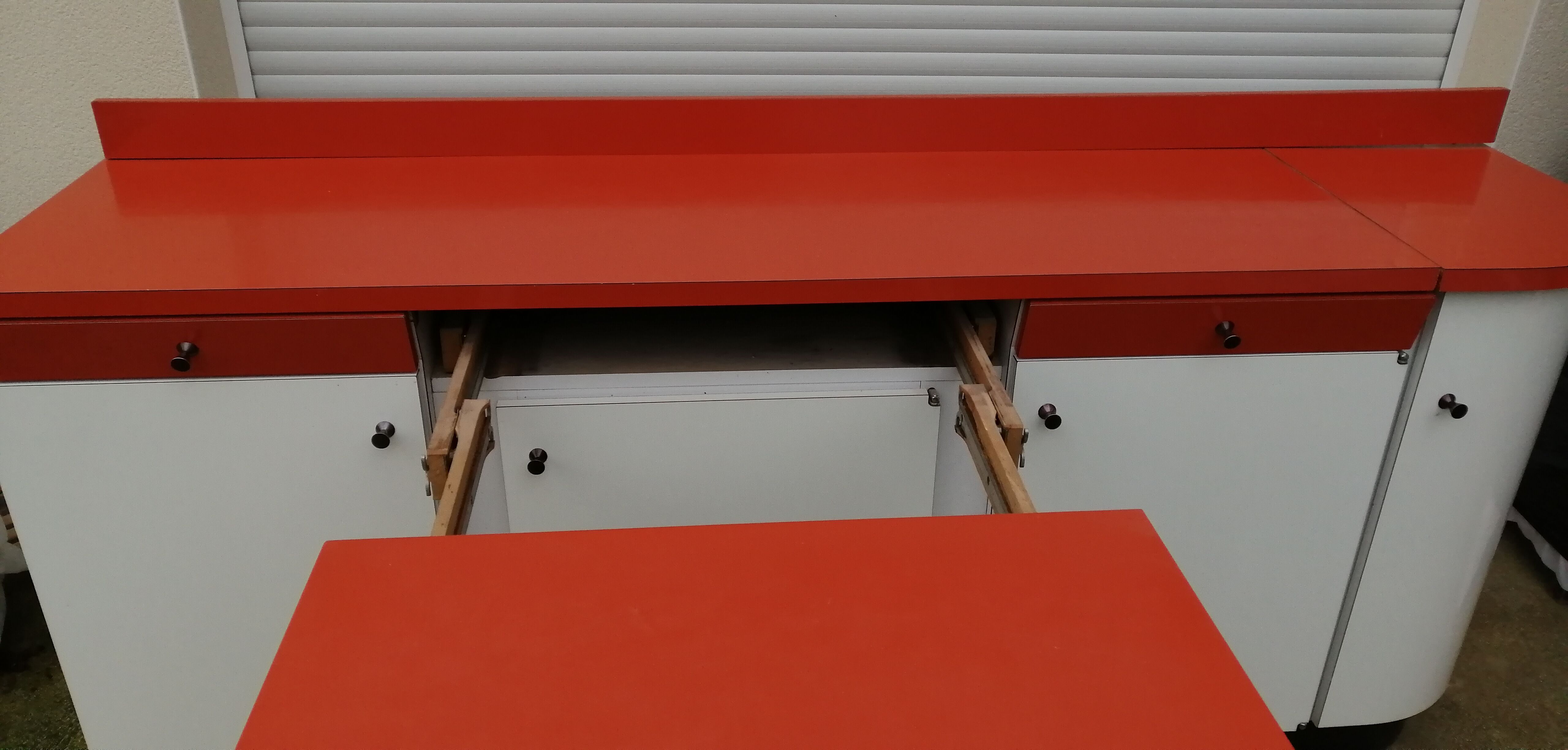 Formica sideboard with its 70' retractable table