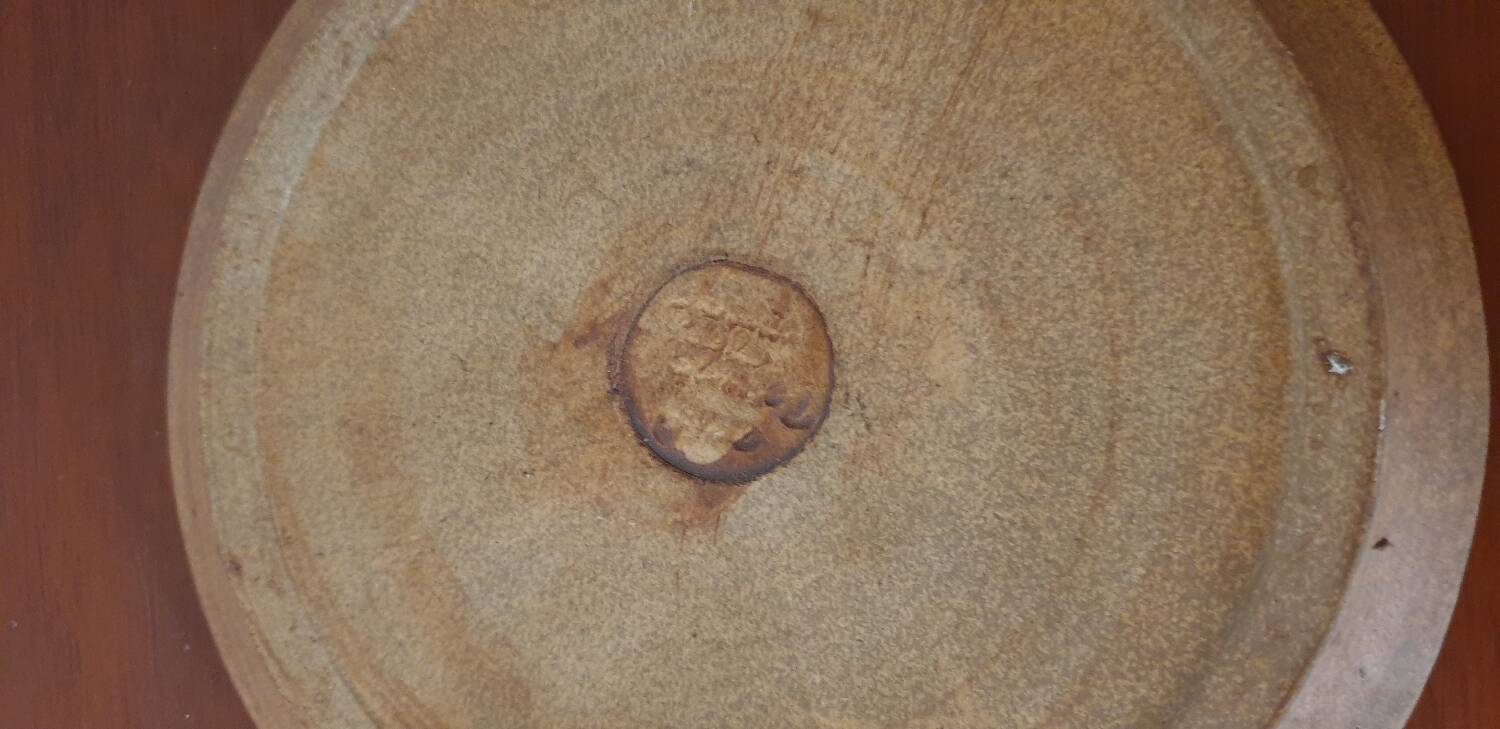 Enameled pottery plate