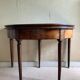 Table demi-lune en noyer