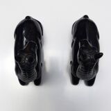 Black marble bookends with lying horses