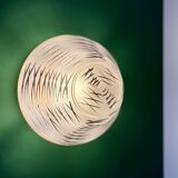 Vintage Art Deco globe wall/ceiling light in white, black, and gold glass.