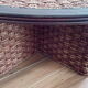 Coffee table in woven rope and rattan