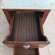 Central island shop counter in marble and oak, Art Deco period.