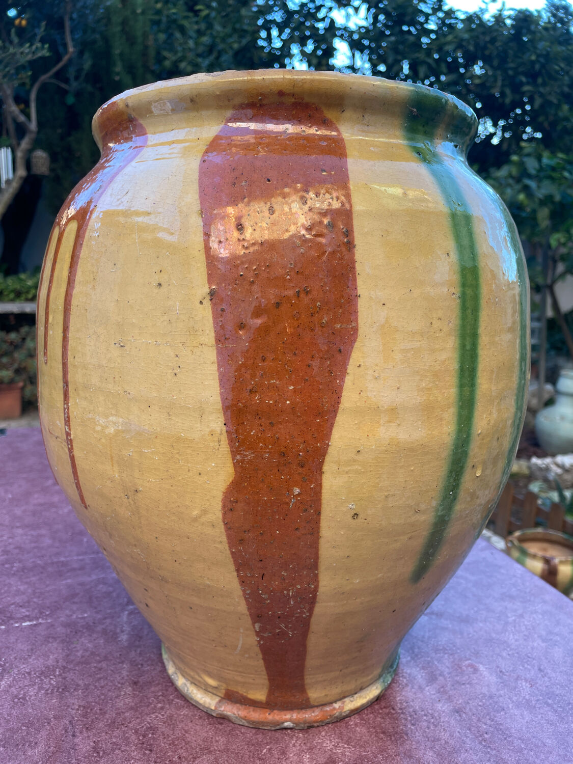Old glazed terracotta jar