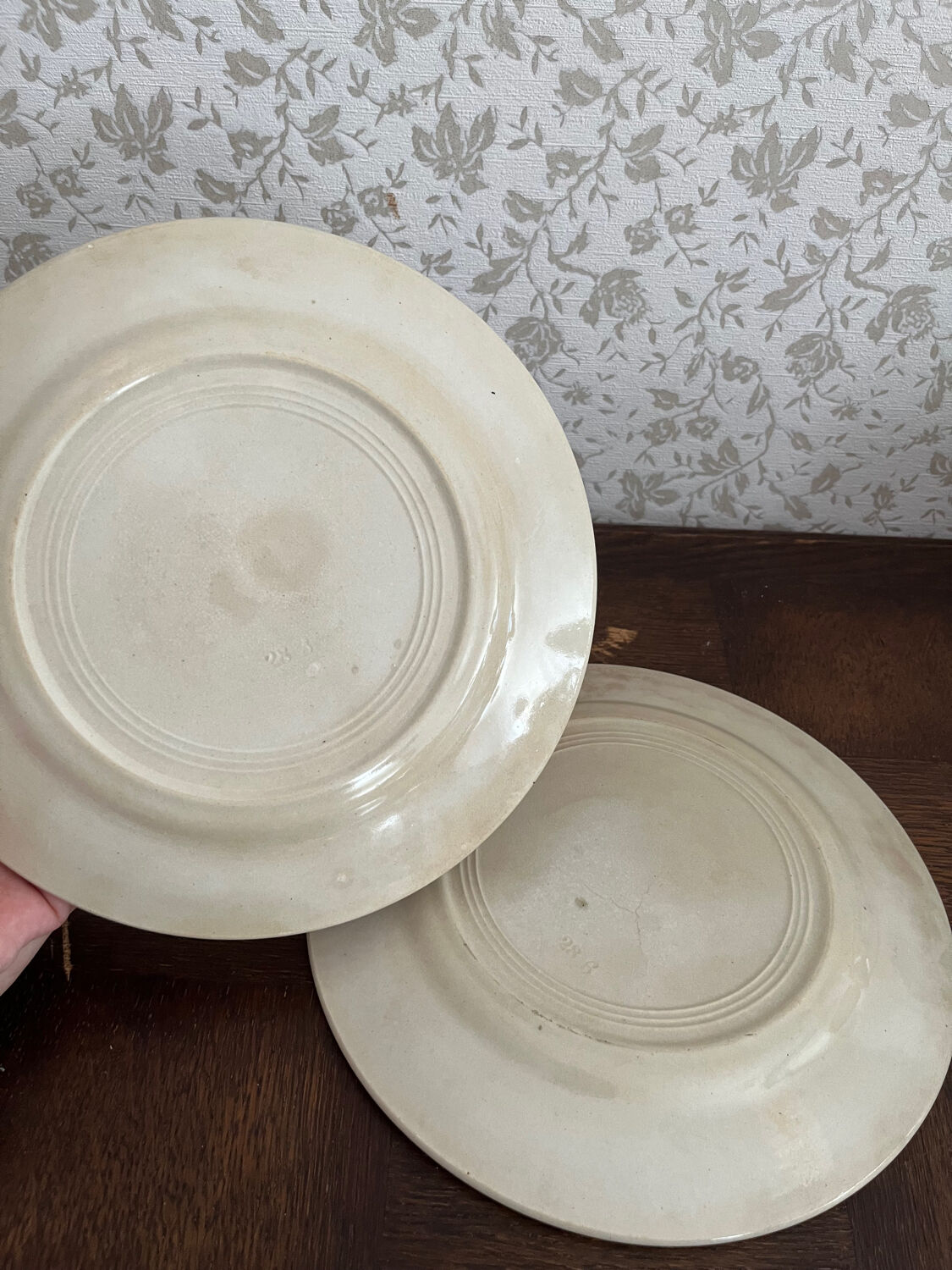 Two pink earthenware plates