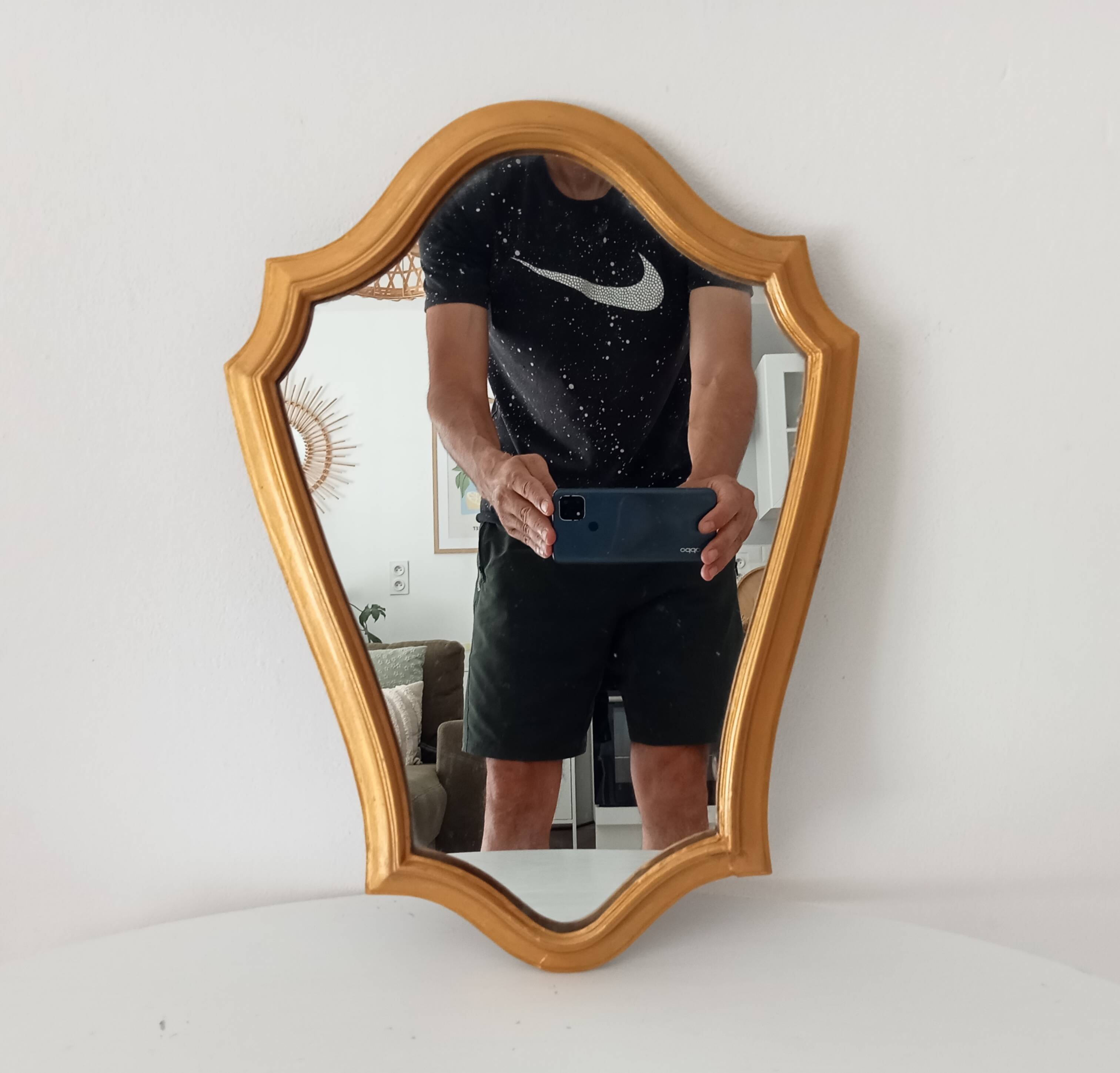 Vintage baroque mirror in gilded wood