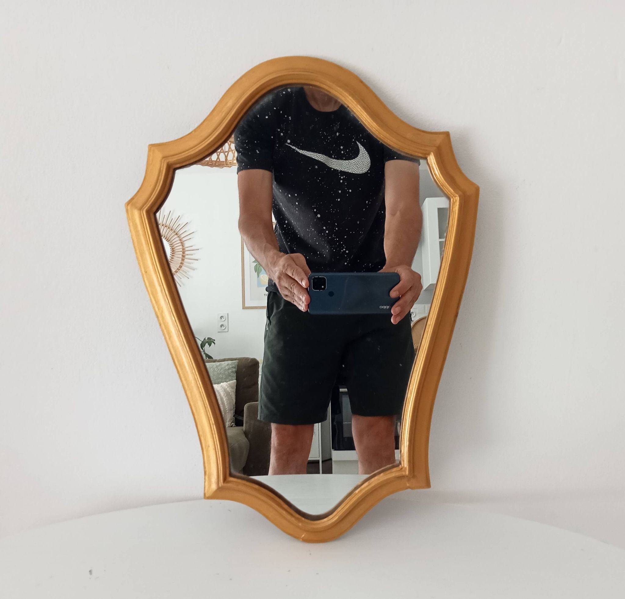 Vintage baroque mirror in gilded wood