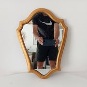 Vintage baroque mirror in gilded wood
