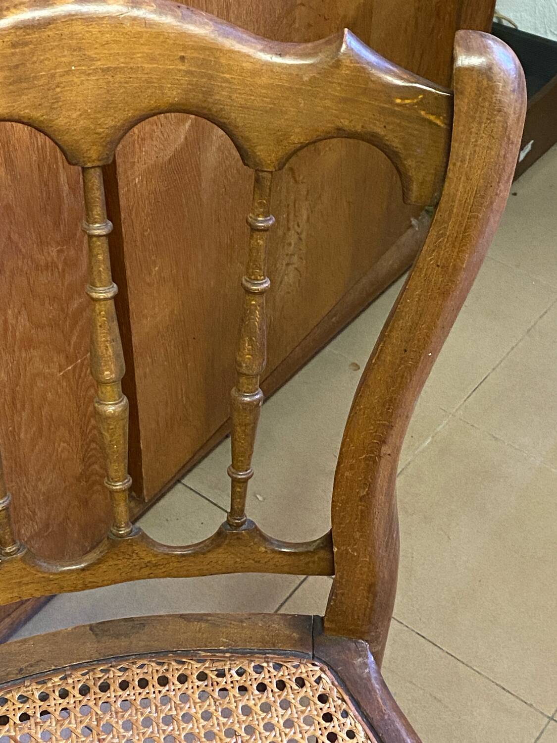 Antique wooden chair, cane seat
