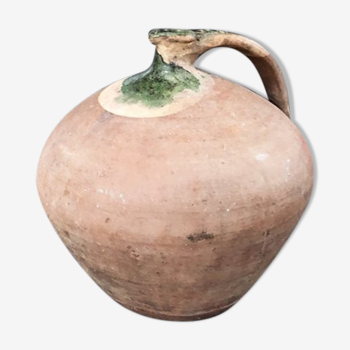 Large old jug cooked buried