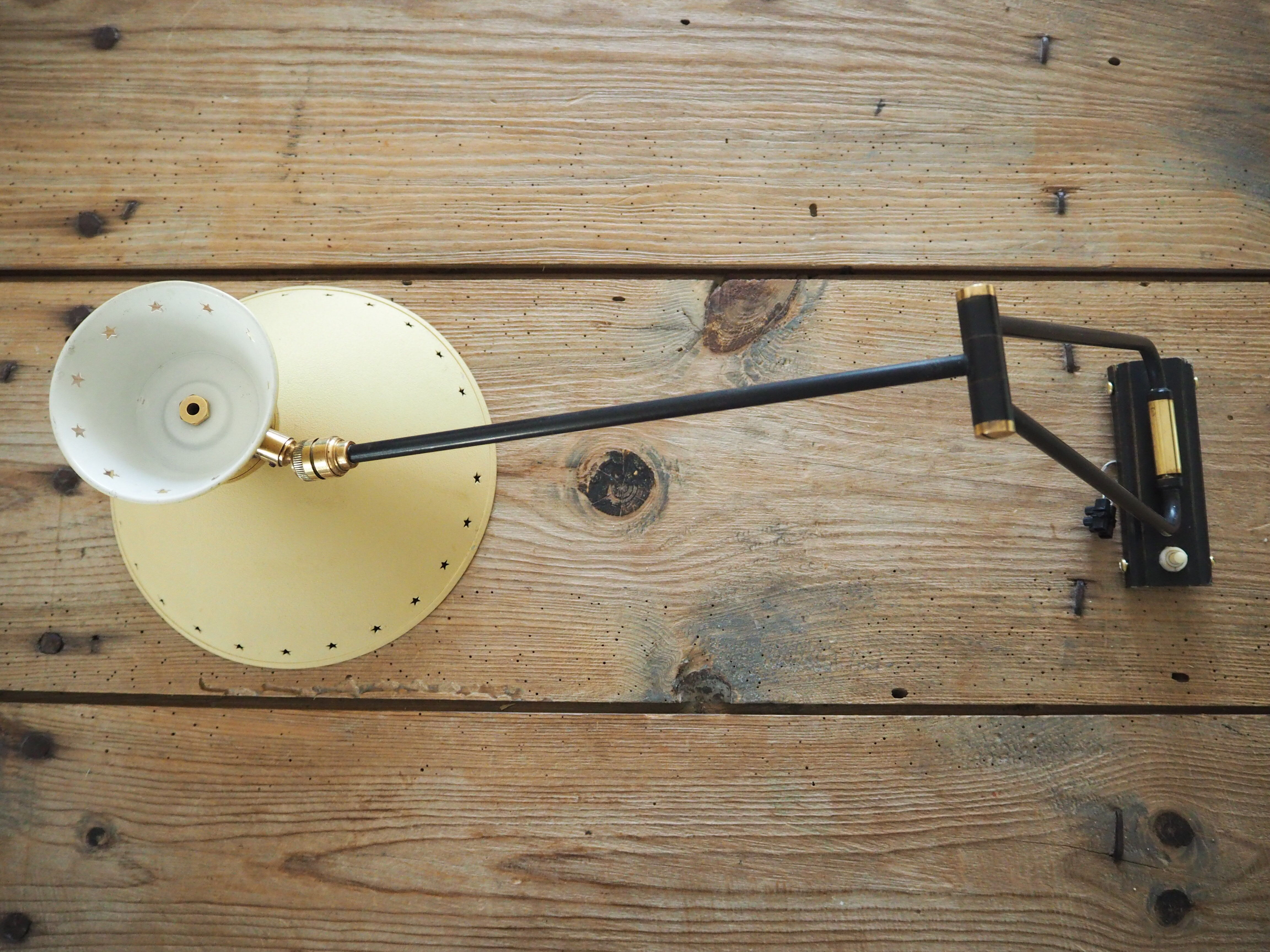 Diabolo articulated wall lamp by designer René Mathieu