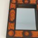 Ceramic mirror in shades of orange