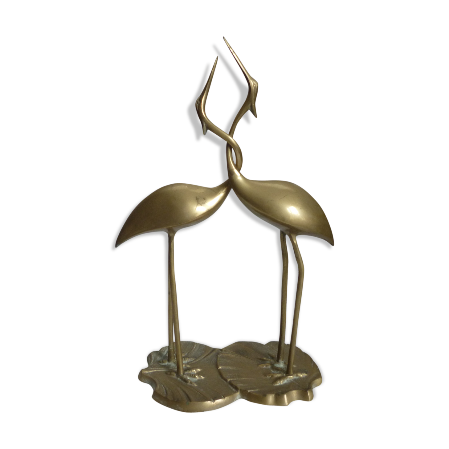Couple of brass herons