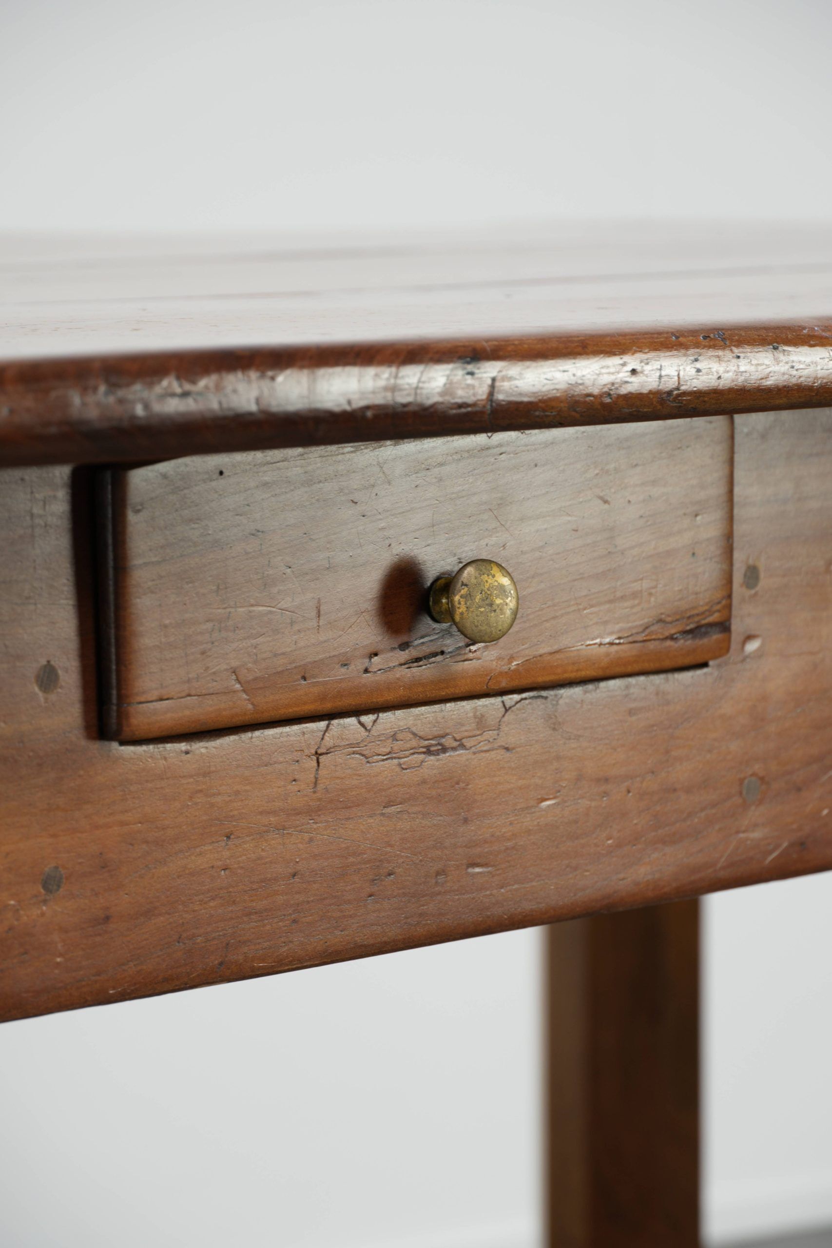 French dining table from the 18th century with a fruitwood top and oak base